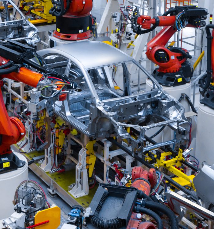 Automotive production line. Welding car body. Modern car Assembly plant Assembly line production of new car. Automated welding of car body on production line. robotic arm on car production line is working